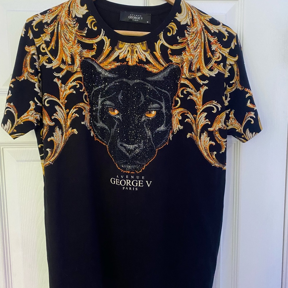 It’s a medium size and brand new authentic George V